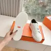 Hermès Women White Low-Top Sneakers — Black Tongue Detail product view 2