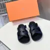 Hermès Women Navy Blue Leather And Fabric Sandals product view 1