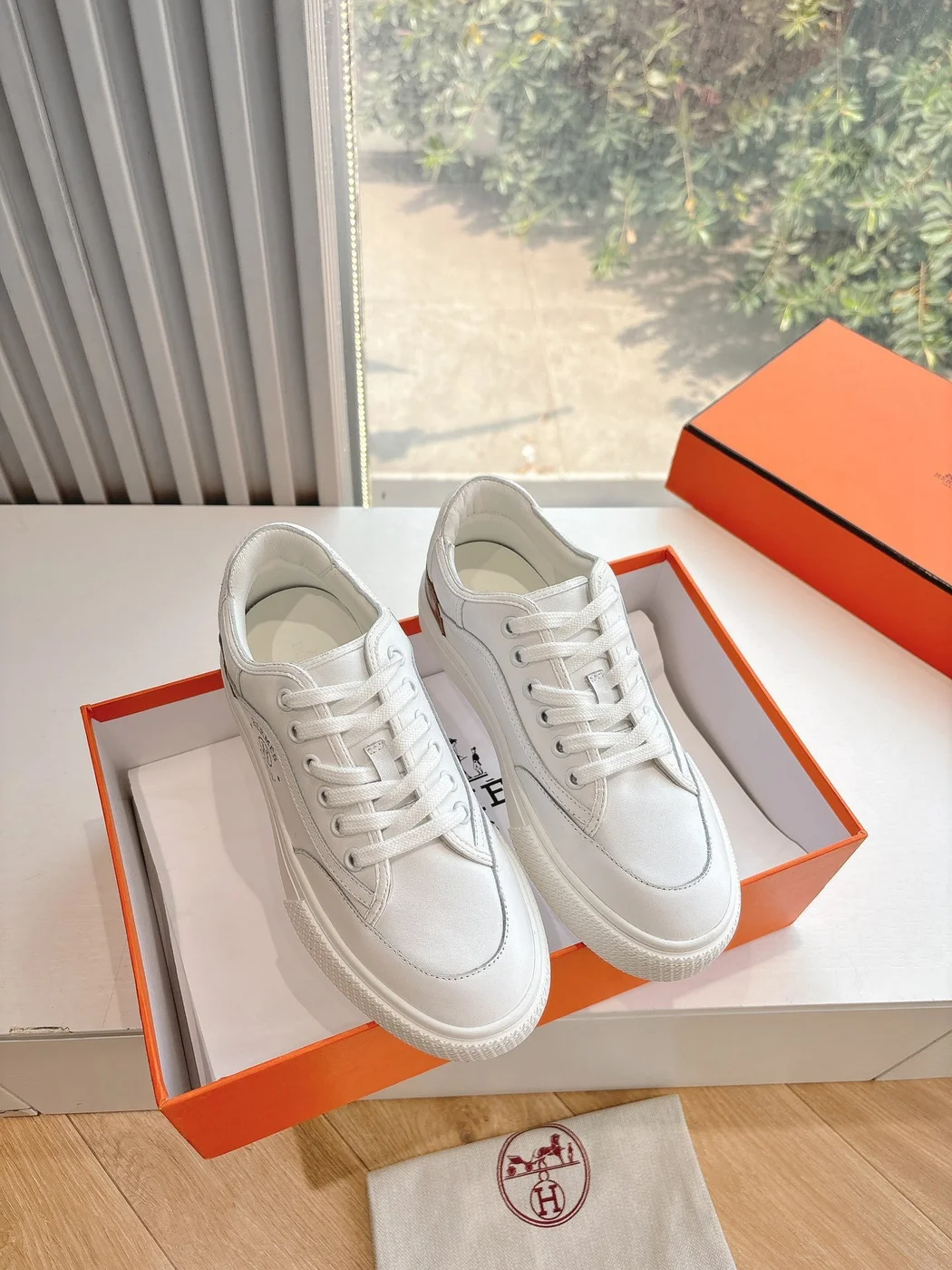 Hermès Women White Low-Top Sneakers — Plain Lace-Up Style product view 1