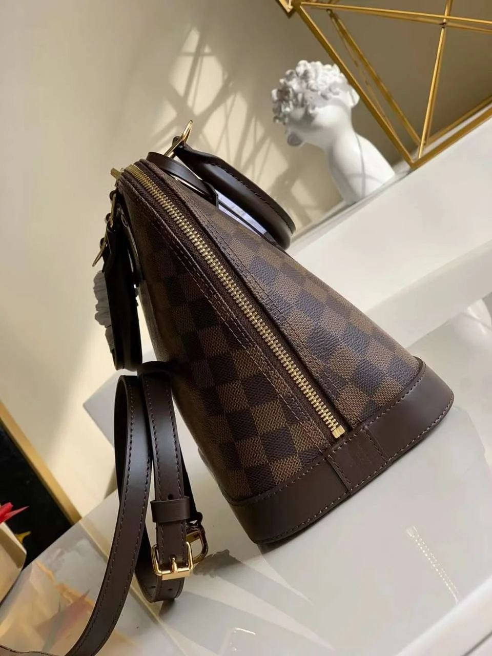 Louis Vuitton Damier Ebene Alma PM Bag Brown product view 2