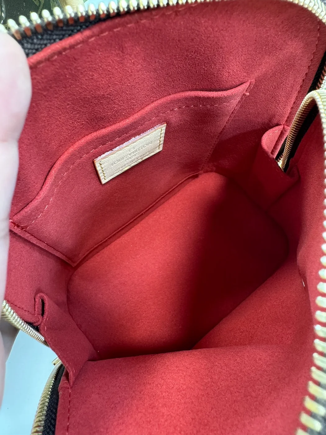Louis Vuitton Alma backpack in the signature brown monogram canvas product view 2