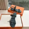 Hermès Women Black Leather Sandals — Two-Strap Metal-Bar Detail product view 3