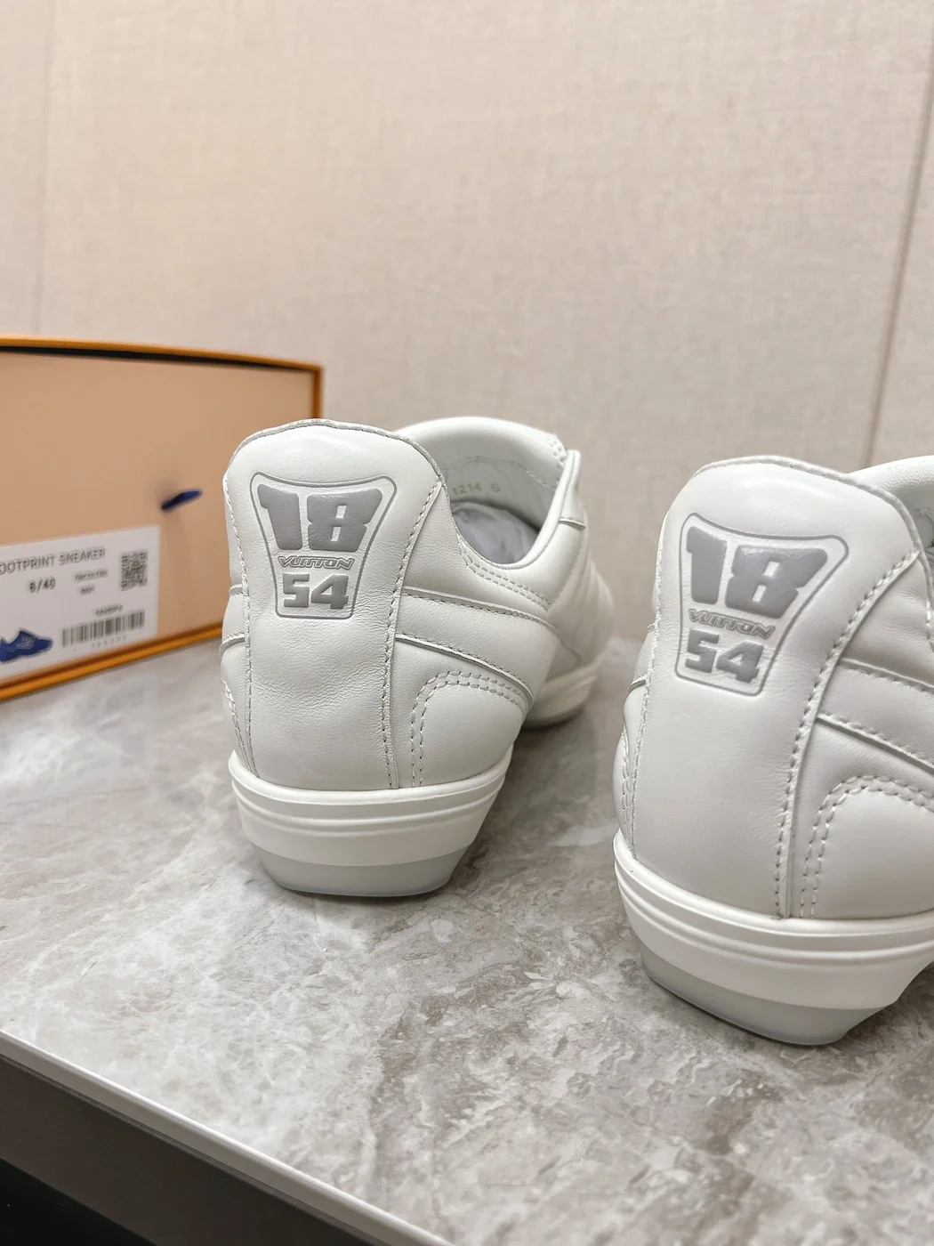Louis Vuitton Women White Leather Sneakers — Outlined LV Side Detail product view 4