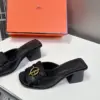 Hermès Women Black Leather Mules — Gold-Tone Buckle Open-Toe Style product view 4