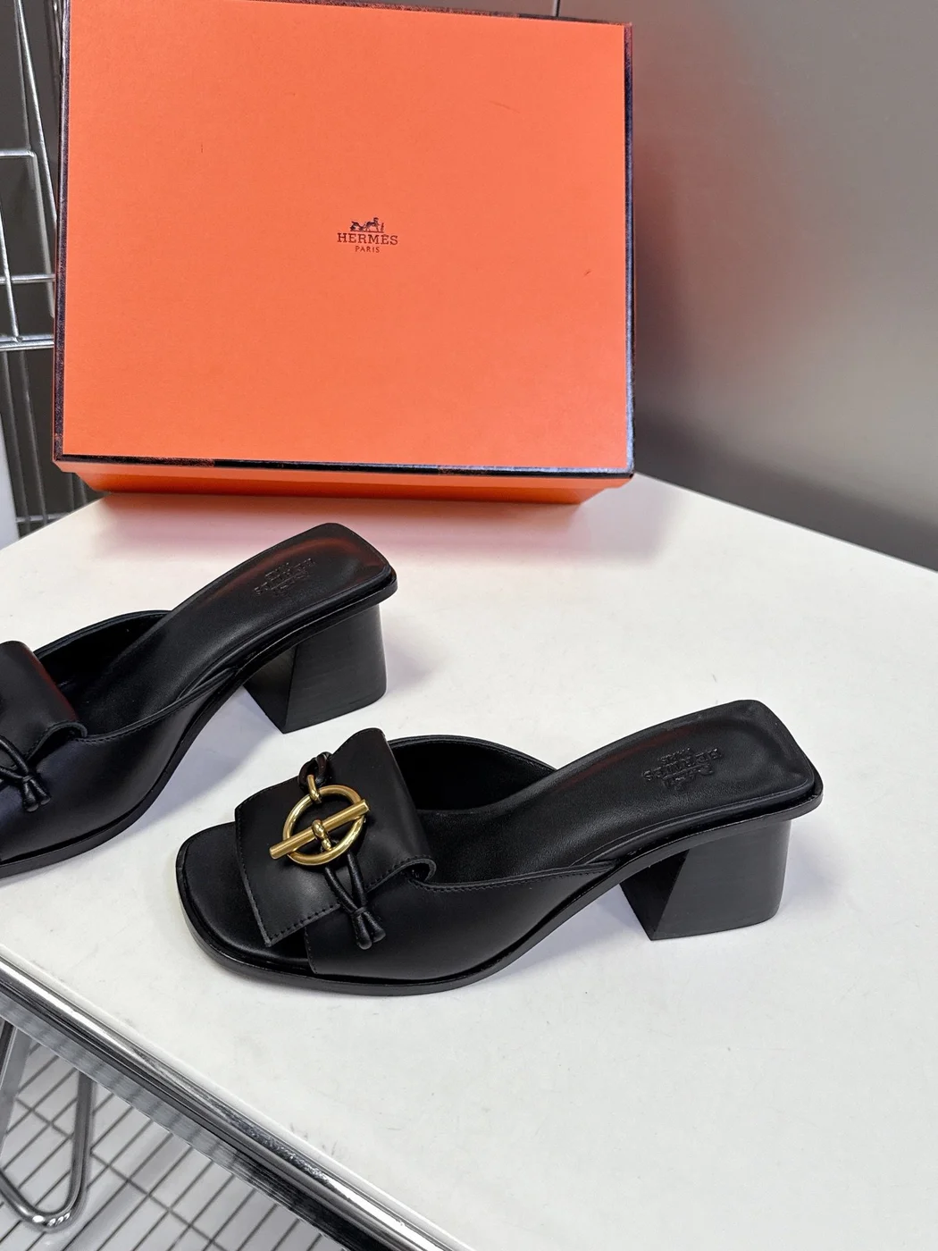 Hermès Women Black Leather Mules — Gold-Tone Buckle Open-Toe Style product view 4