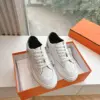 Hermès Women White Low-Top Sneakers — Black Tongue Detail product view 1