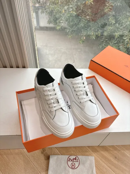 Hermès Women White Low-Top Sneakers — Black Tongue Detail product photo