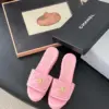 Chanel Women Pink Quilted Leather Slides — Gold-Tone CC Detail product view 1