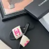 Chanel Women Black Leather And Beige Fabric Slides product view 3