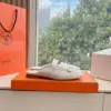 Hermès Women White Leather Mules — Metal-Bar Loafer Style product view 2