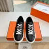 Hermès Women Black Leather Sneakers With Buckle Strap product view 1