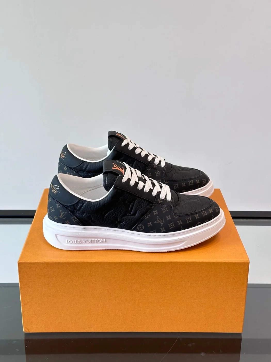 Louis Vuitton Men Sneakers — Black and White Monogram product view 1