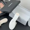 Chanel Women Cream Quilted Leather Slides product view 4