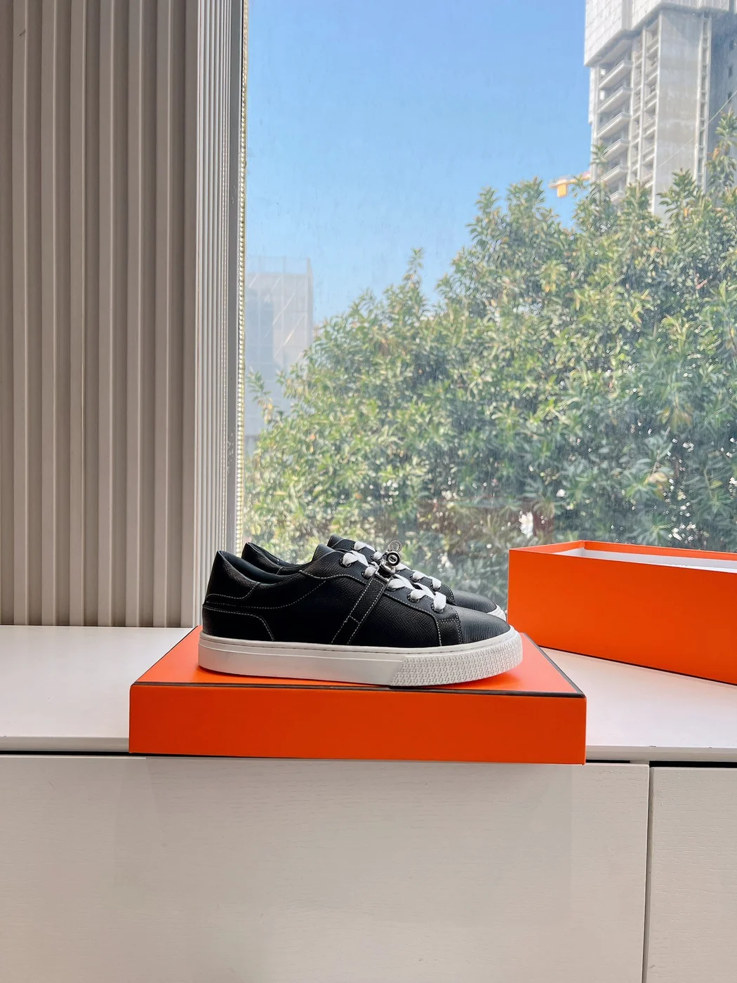 Hermès Women Black Leather Sneakers With Buckle Strap product view 2