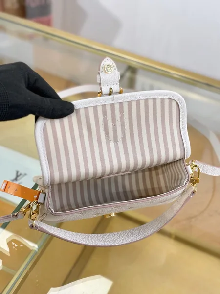 Louis Vuitton Nano Diane bag in cream Monogram Empreinte product view 7