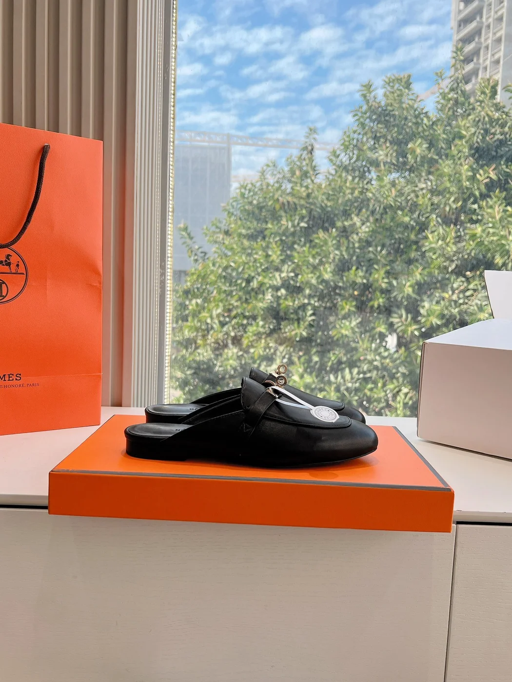 Hermès Women Black Leather Mules — Metal-Bar Loafer Style product view 2