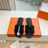 Hermès Women Black Leather Embellished Slippers product view 1
