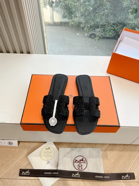 Hermès Women Black Leather Embellished Slippers product photo