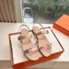Hermès Women Beige Leather Strappy Sandals — Metal-Bar Strap Detail product view 1