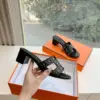 Hermès Women Black Leather Studded Mules product view 5