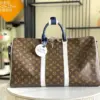 Louis Vuitton Monogram Travel Bag with Blue Handles, 50 x 29 x 22 cm product view 1
