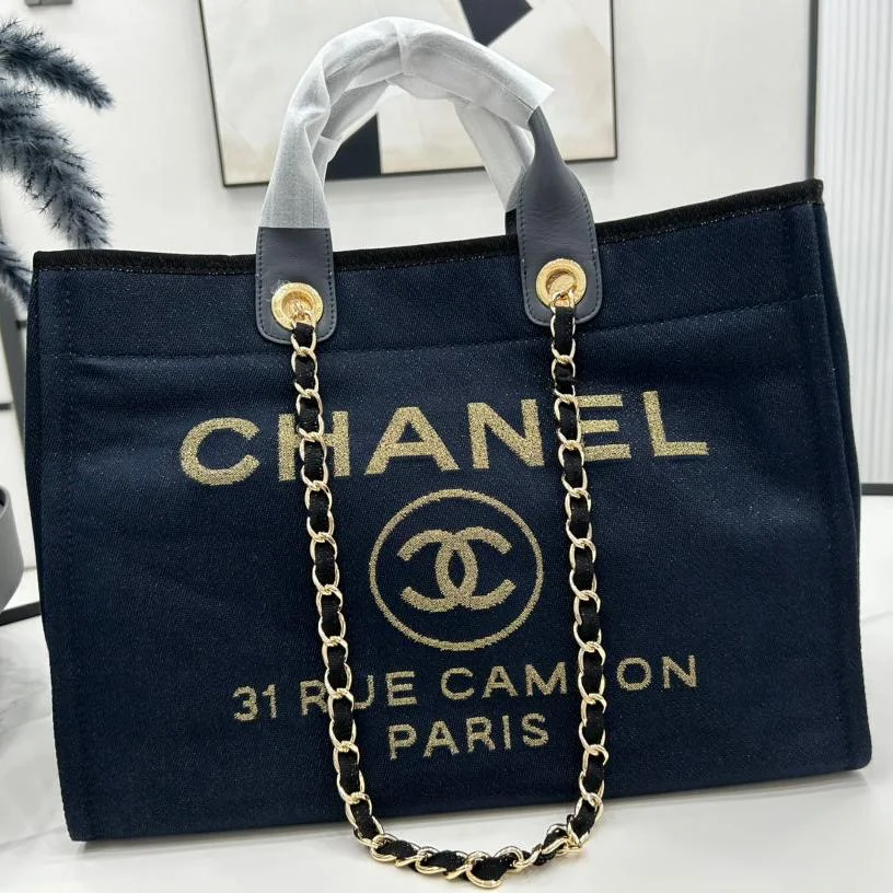 Chanel Deauville Large 38 Tote Bag In Black Canvas With Gold Embroidered Logo product view 1