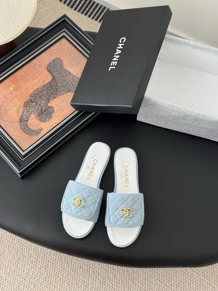 Chanel Women Quilted-Fabric Slides — Pale Blue and White product photo