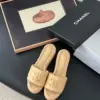 Chanel Women Beige Quilted Leather Slides — Chain-Woven CC Detail product view 1