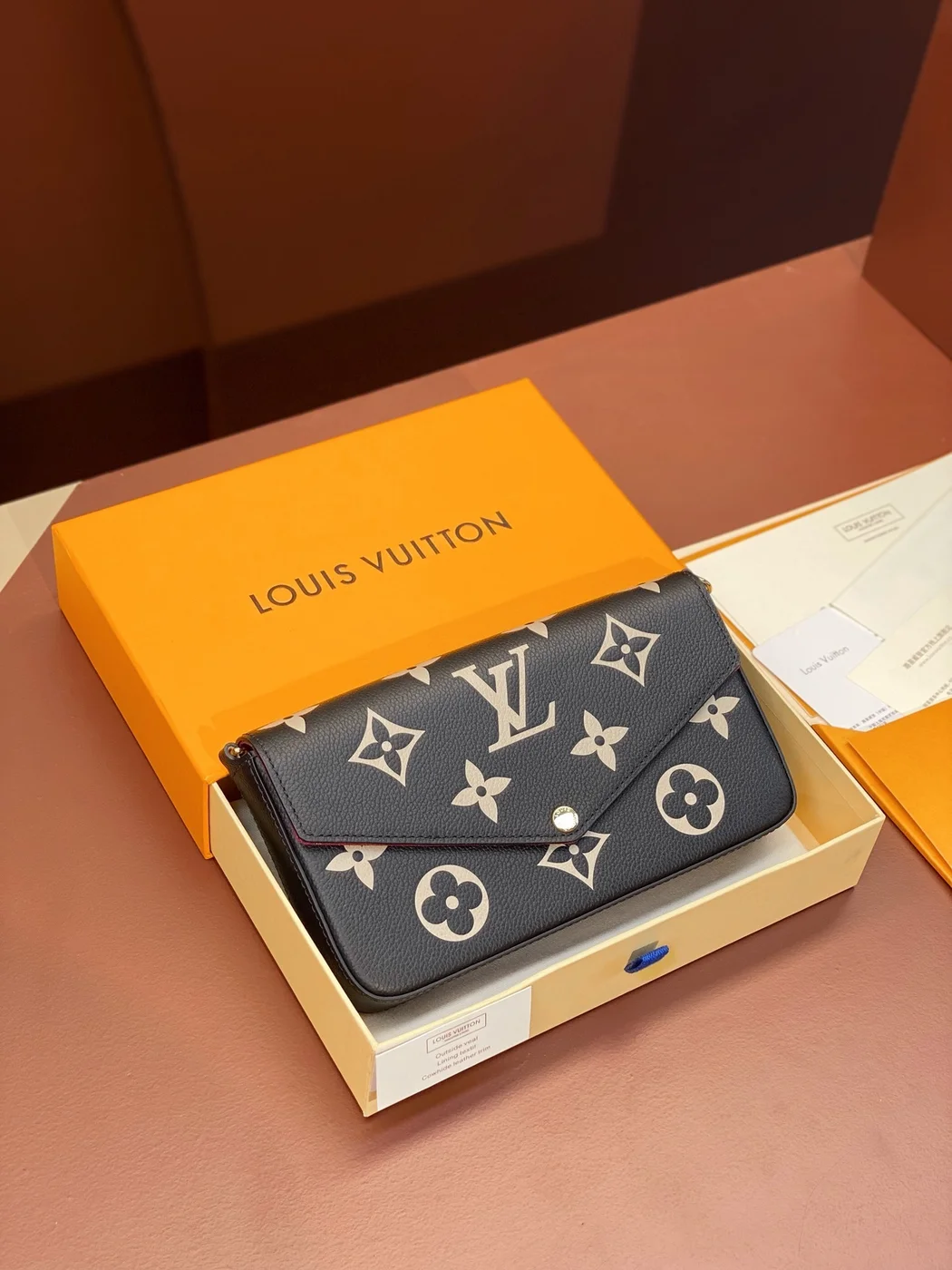 Louis Vuitton Félicie Pochette Bag — Black and Cream Monogram product view 1