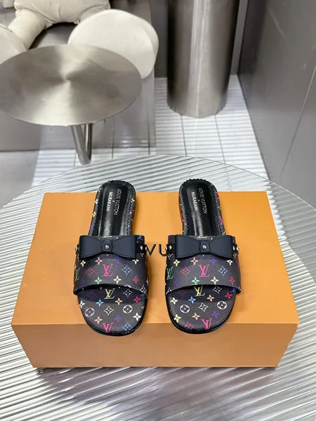 Louis Vuitton Women Black Patterned Leather Bow Slide Sandals product photo