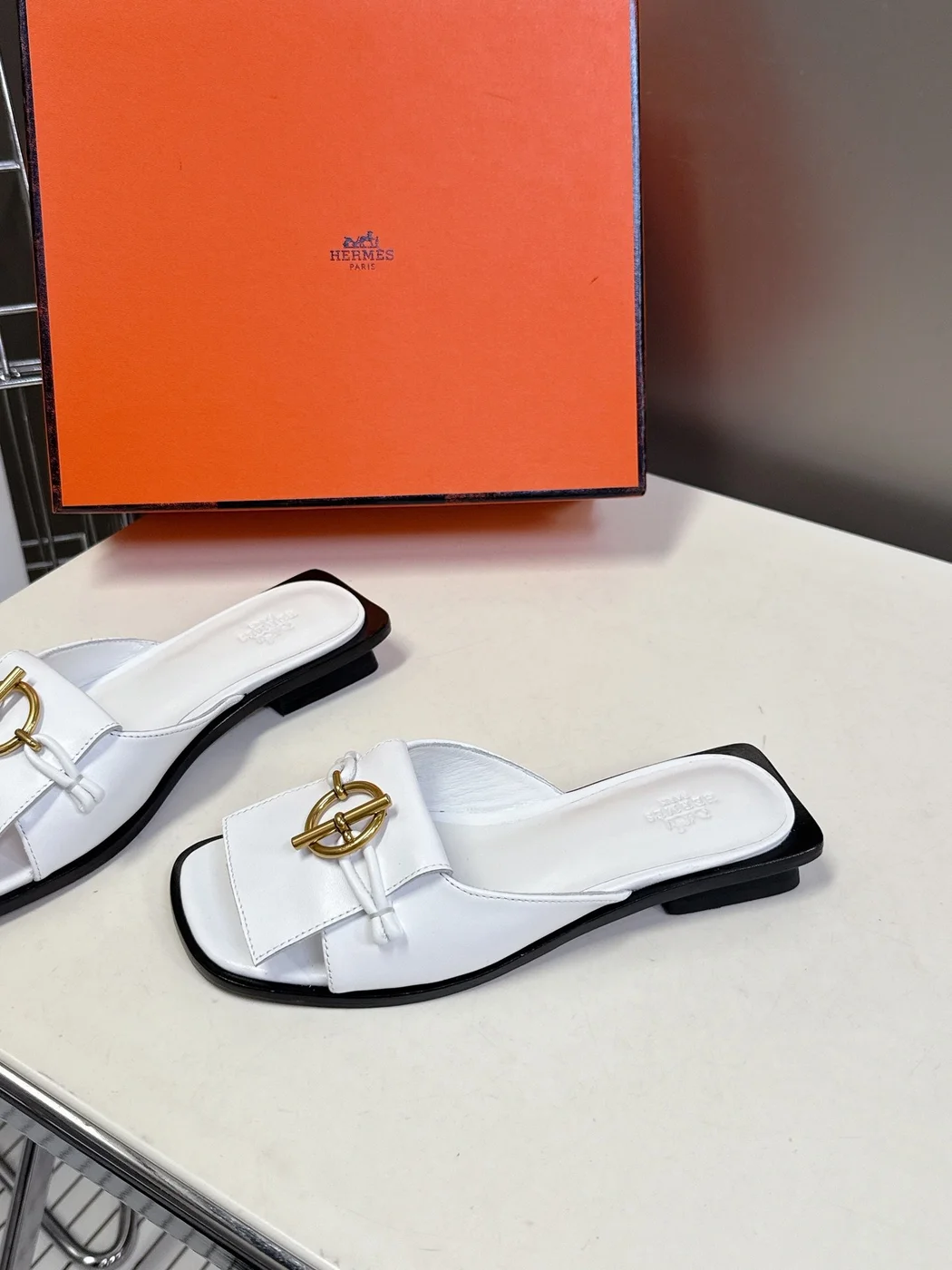 Hermès Women White Leather Mules — Gold-Tone Buckle Open-Toe Style product view 3