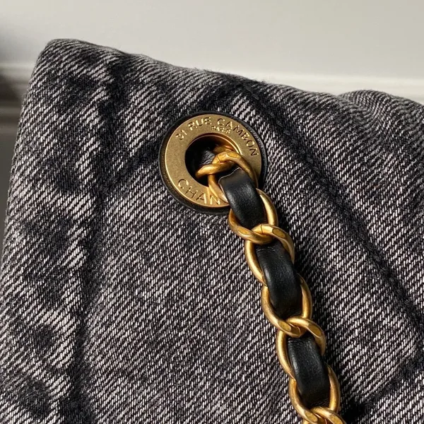 Chanel Maxi Flapbag in washed denim with gold-tone metal hardware Bag product view 2