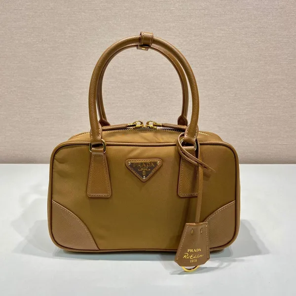 Prada Small Top Handle Bag 25 In Golden Brown Nylon And Calfskin Trim product photo