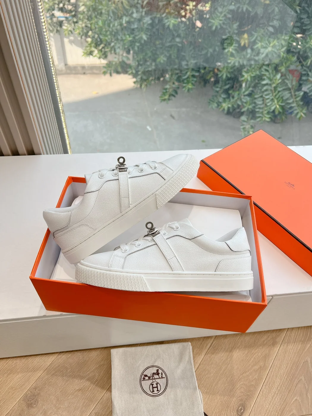 Hermès Women White Low-Top Sneakers — Silver-Tone Buckle Detail product view 4