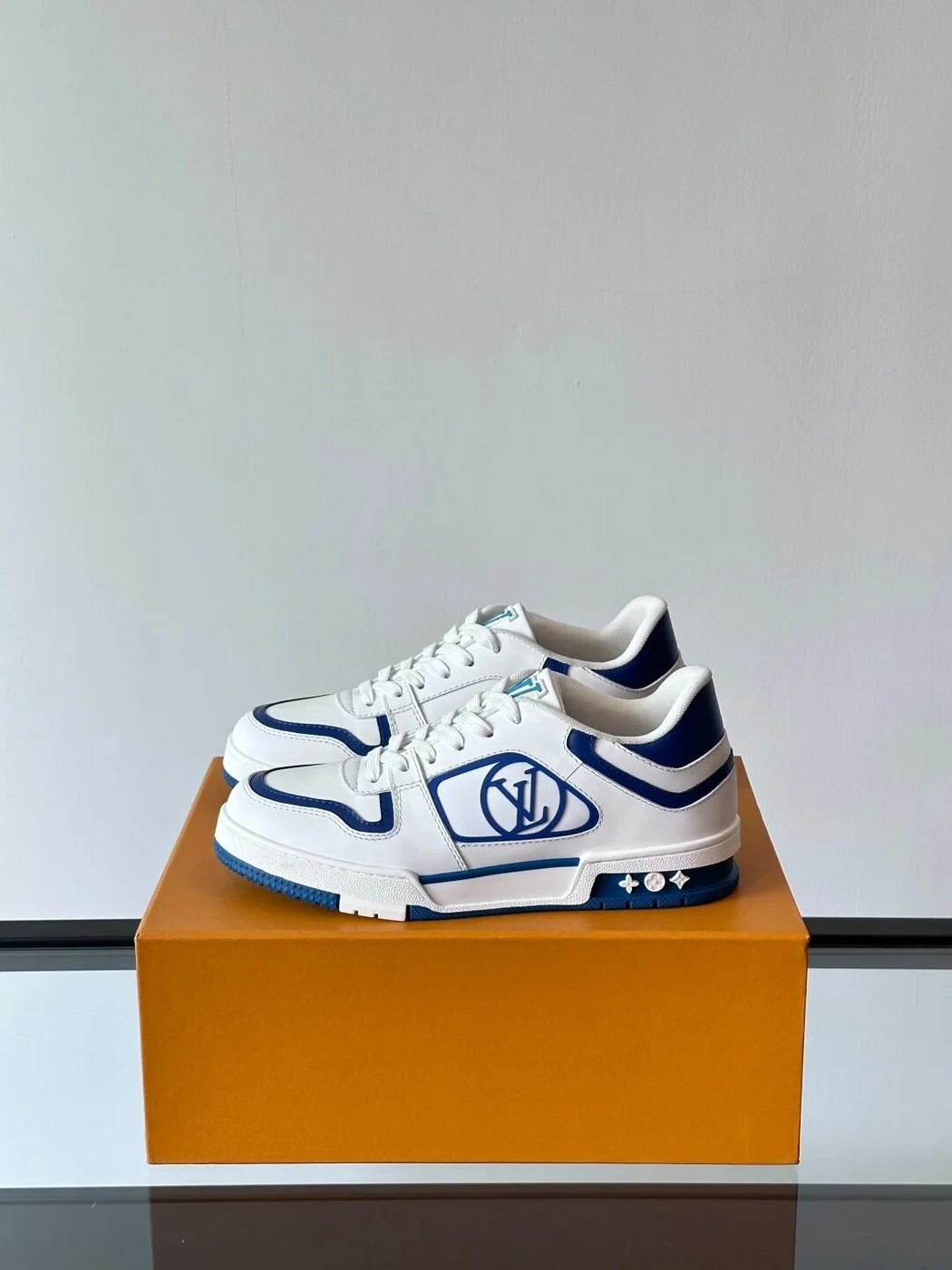 Louis Vuitton Men White and Blue Sneakers — Oval LV Side Detail product view 3