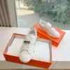 Hermès Women White Low-Top Sneakers — Silver-Tone Buckle Detail product view 5
