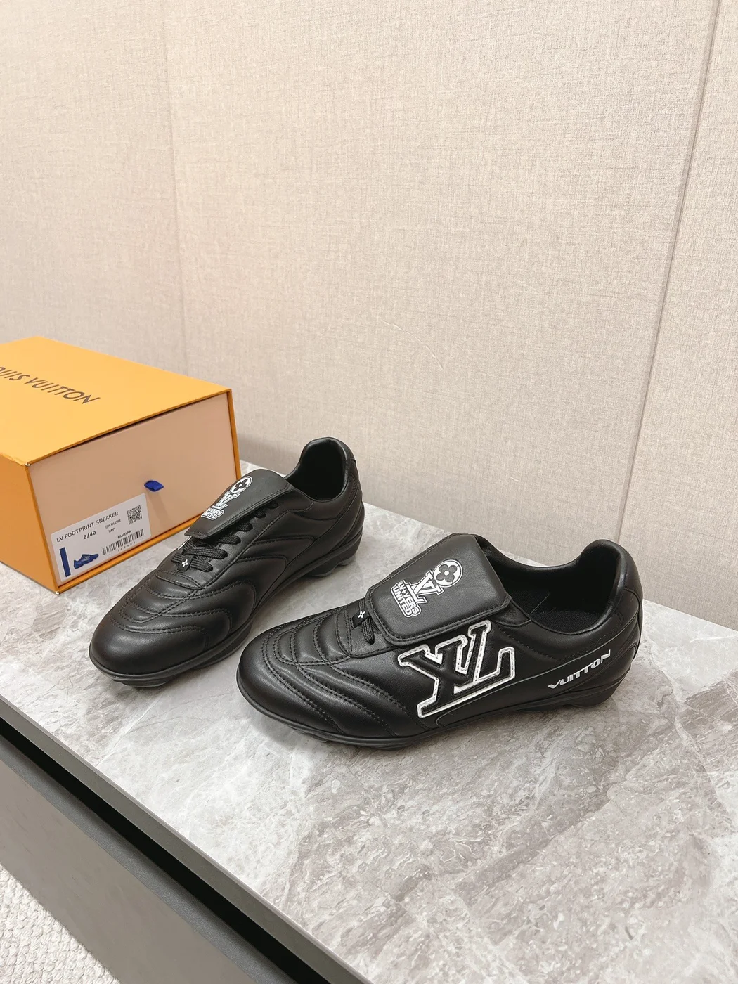 Louis Vuitton Women Black Leather Sneakers — Outlined LV Side Detail product view 3