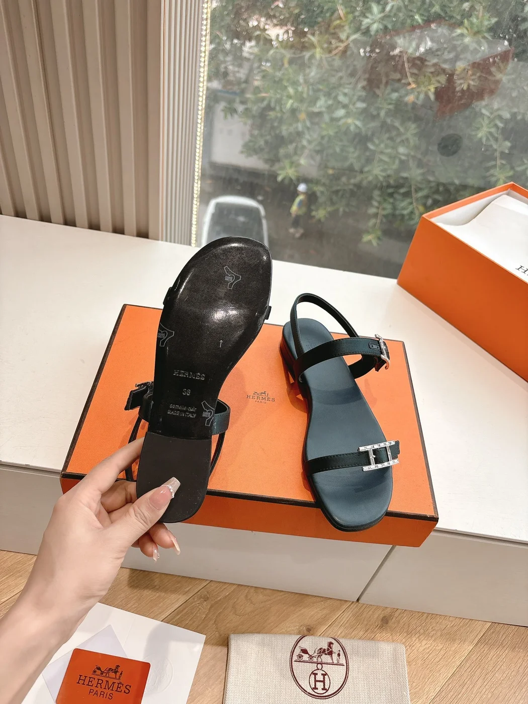 Hermès Women Black Leather Sandals — Two-Strap Metal-Bar Detail product view 6