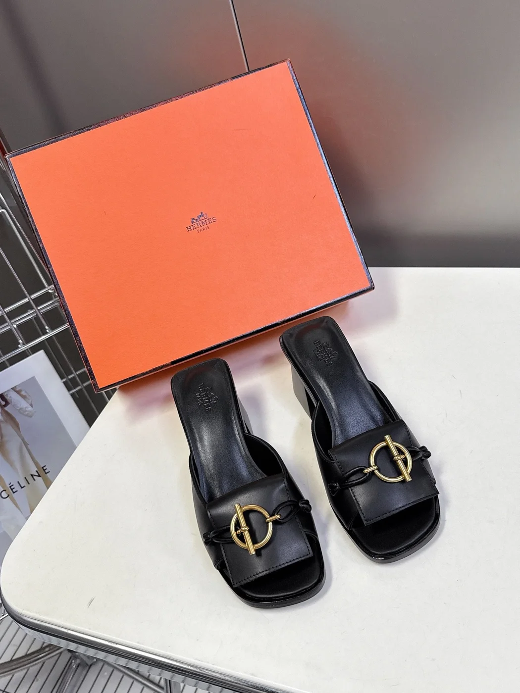 Hermès Women Black Leather Mules — Gold-Tone Buckle Open-Toe Style product view 1
