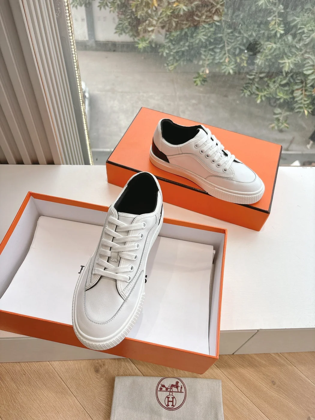 Hermès Women White Low-Top Sneakers — Black Tongue Detail product view 3