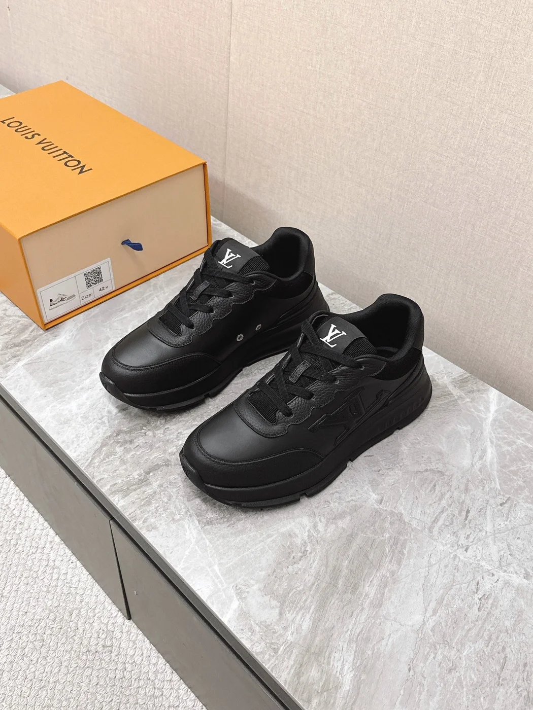 Louis Vuitton Women Black Leather Sneakers — Monogram Side Panels product view 1