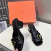 Hermès Women Black Leather Mules — Gold-Tone Buckle Open-Toe Style product view 5