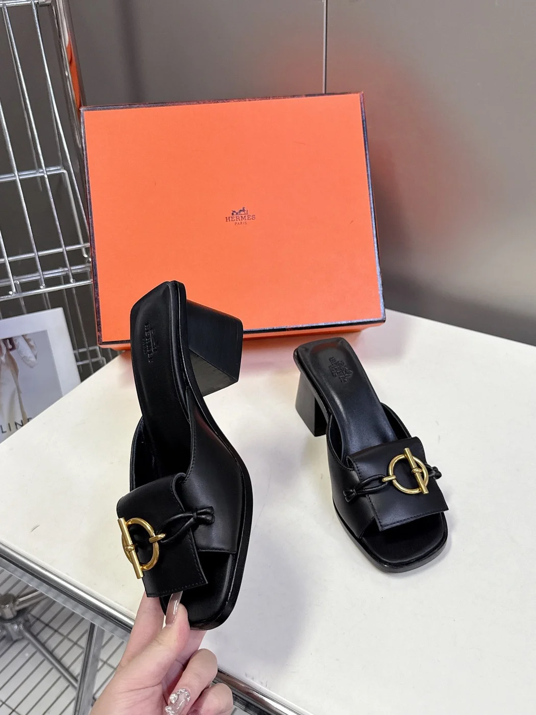 Hermès Women Black Leather Mules — Gold-Tone Buckle Open-Toe Style product view 5