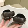 Louis Vuitton Women Black Leather Mules — Bow Detail product view 2