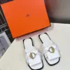 Hermès Women White Leather Mules — Gold-Tone Buckle Open-Toe Style product view 1