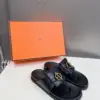 Hermès Women Black Leather Sandals — Gold-Tone Buckle Slides product view 4