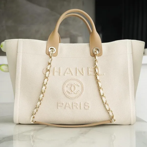 Chanel Tote Bag 39 Attached Pearl Logo In Beige Canvas Gold Hardware product photo