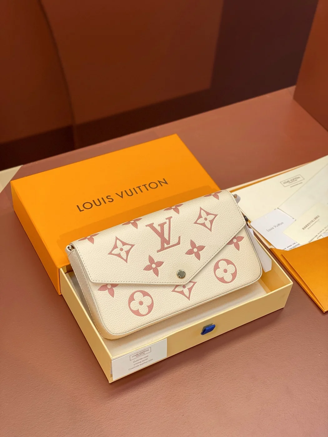 Louis Vuitton Félicie Pochette Bag — Cream with Red Monogram product view 1