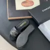 Chanel Women Black Leather Quilted Slides — Chain-Woven CC Detail product view 5