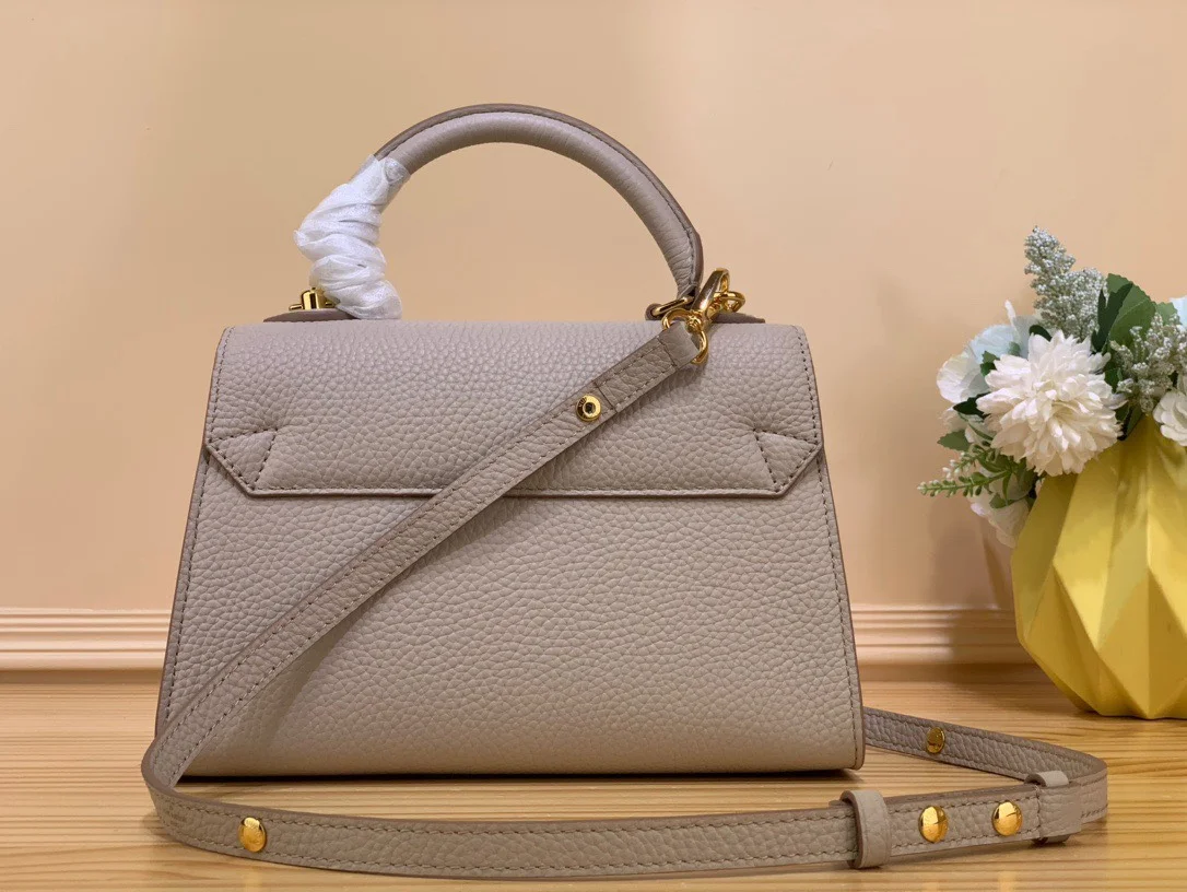 Louis Vuitton Twist Handle Lock Gold Handbags 17x25x11cm product view 9